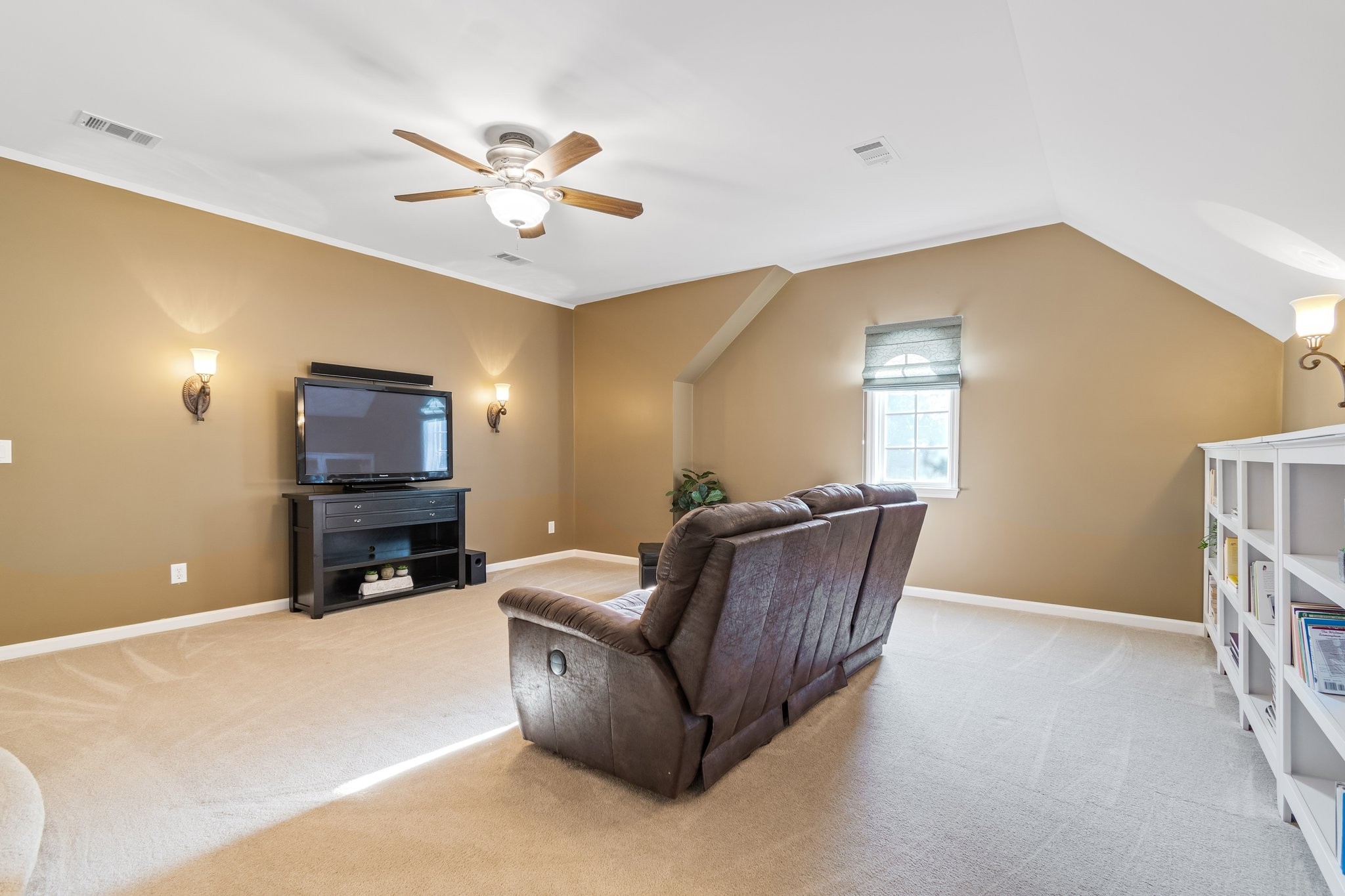 5028 Abington Ridge Lane Franklin, TN 37067 - Photo 49 of 68 a living room with furniture and a flat screen tv