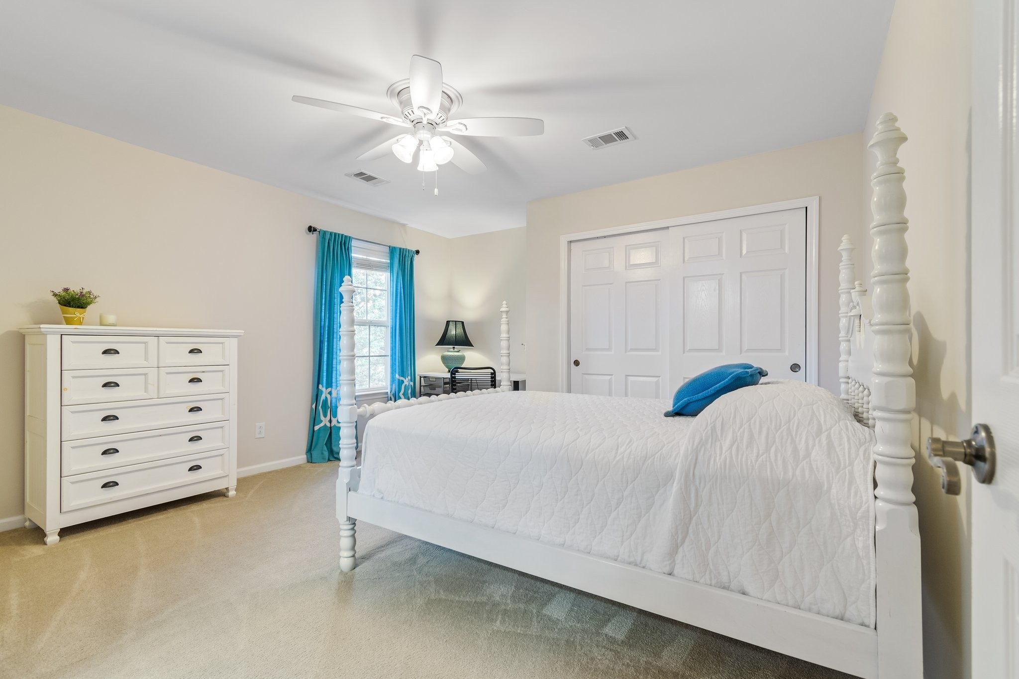 5028 Abington Ridge Lane Franklin, TN 37067 - Photo 52 of 68 a bedroom with a bed and a chandelier