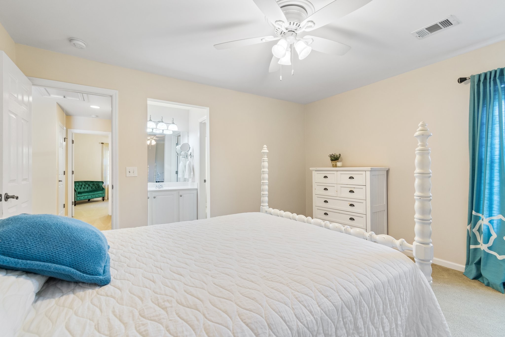 5028 Abington Ridge Lane Franklin, TN 37067 - Photo 54 of 68 a bedroom with a large bed and a chandelier
