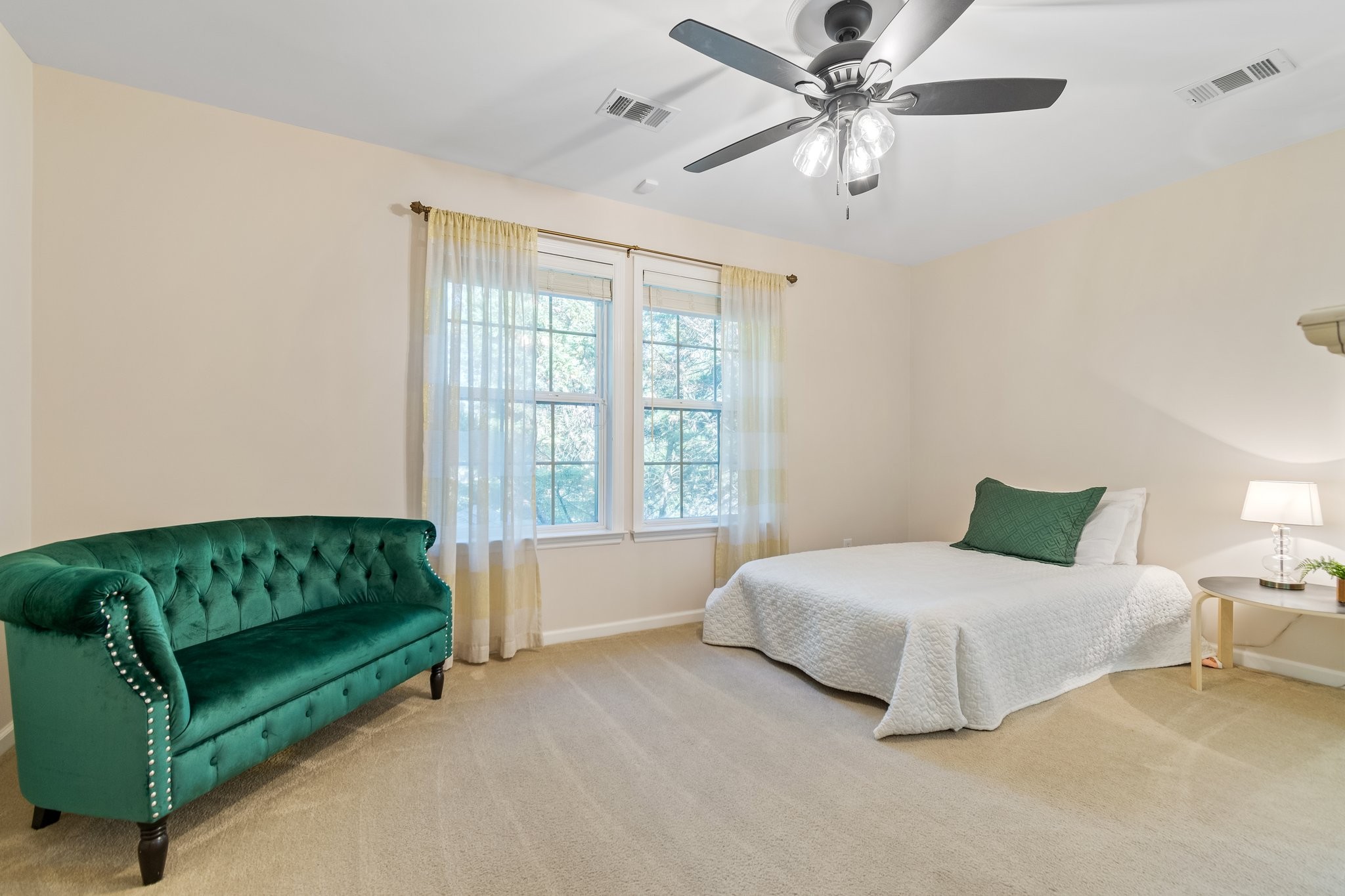 5028 Abington Ridge Lane Franklin, TN 37067 - Photo 56 of 68 a bedroom with a bed couch and window
