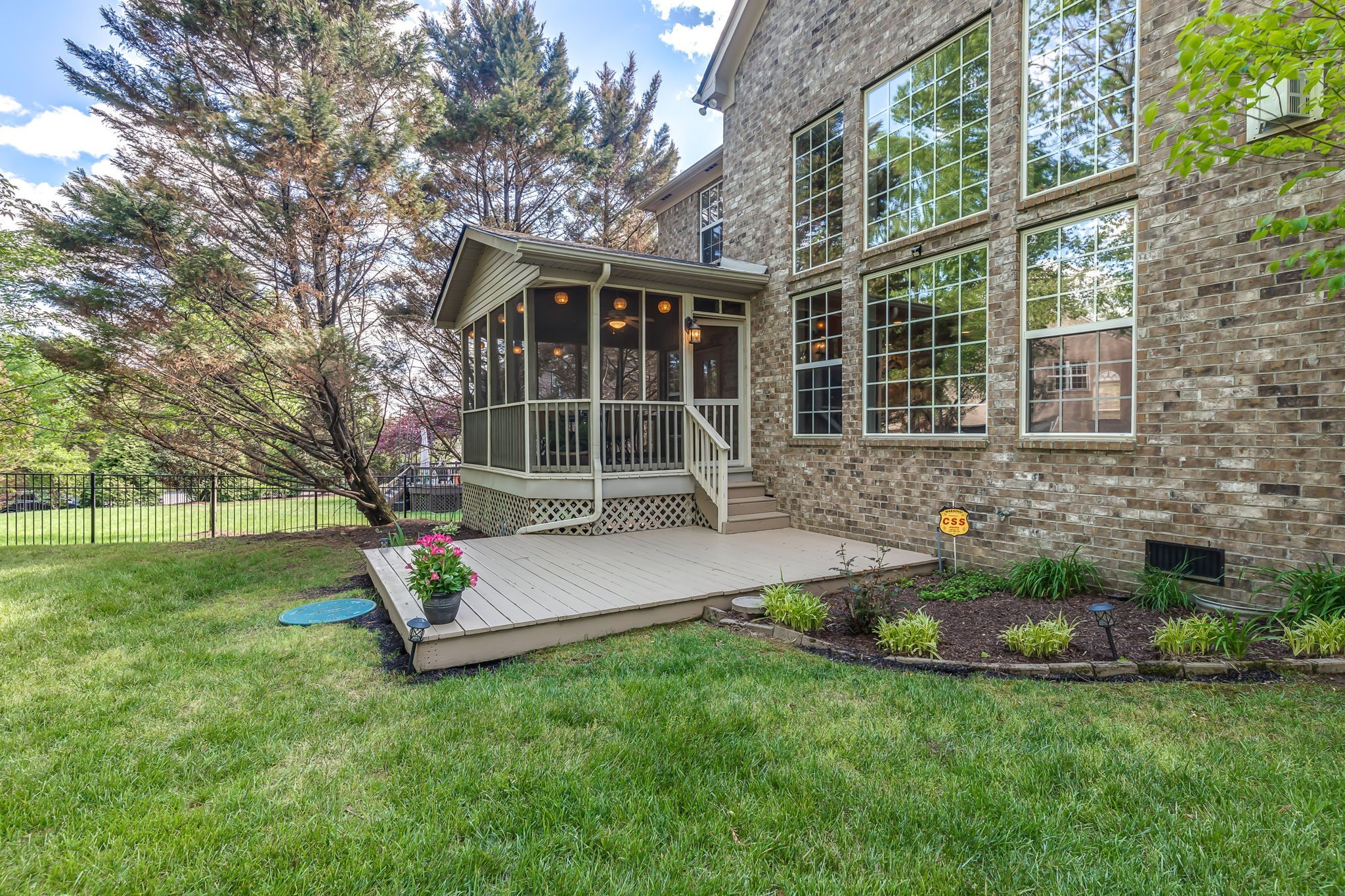 5028 Abington Ridge Lane Franklin, TN 37067 - Photo 62 of 68 a front view of a house with a yard and swing