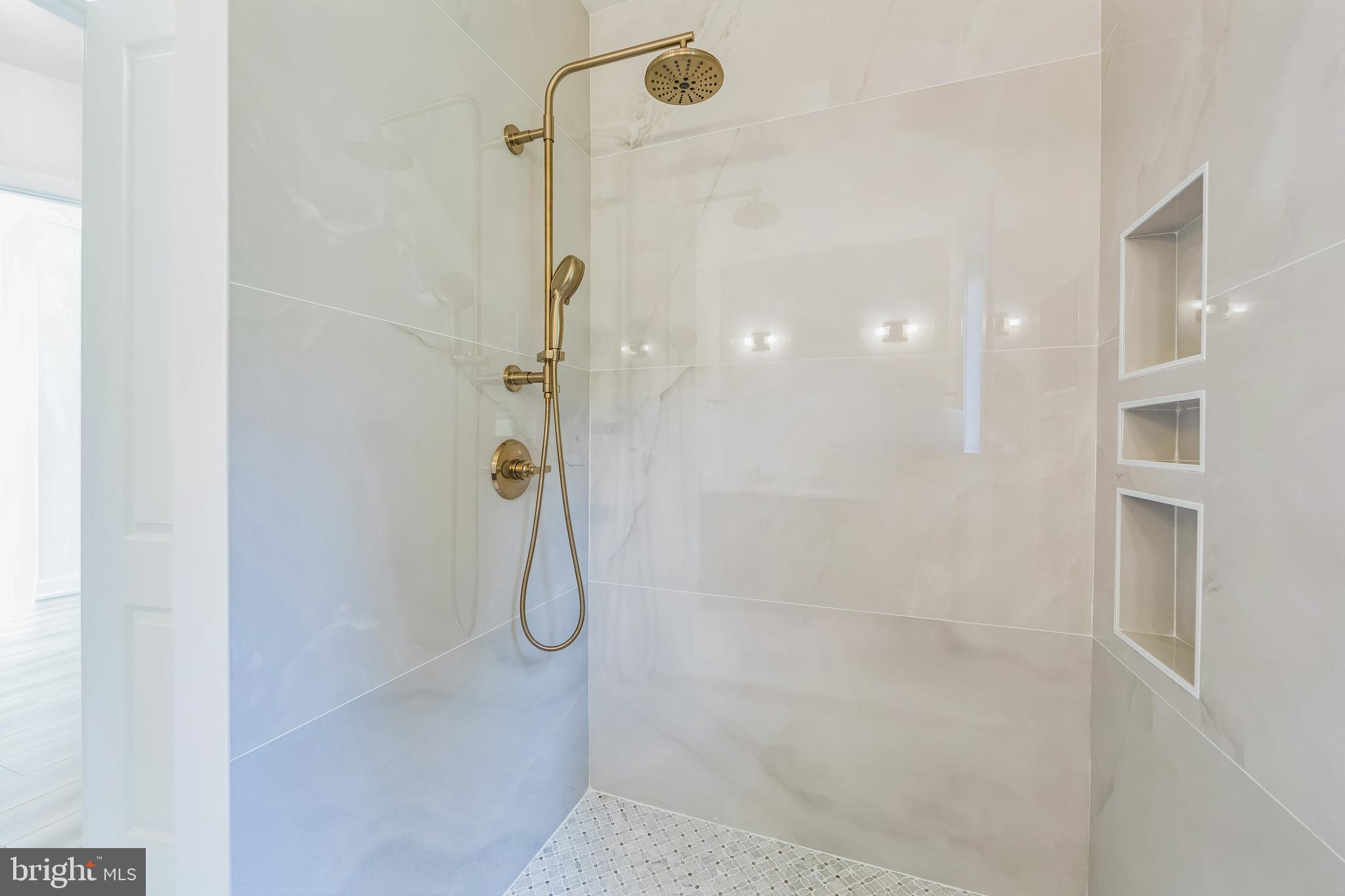 736 Northbrook Road, Unit L2 Kennett Square, PA 19348 - Photo 37 of 60 a bathroom with a shower