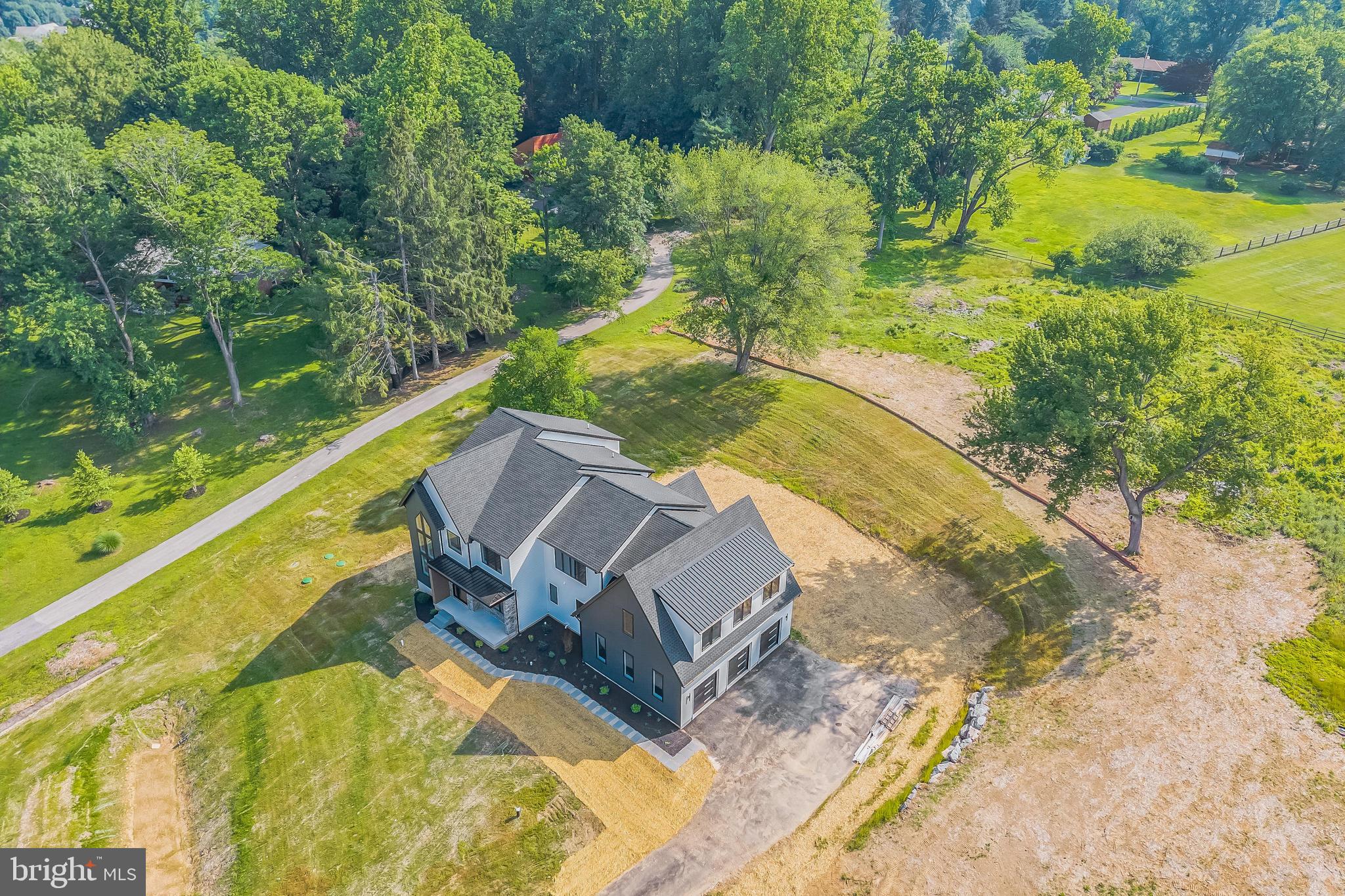 736 Northbrook Road, Unit L2 Kennett Square, PA 19348 - Photo 8 of 60 a view of a swimming pool with a yard