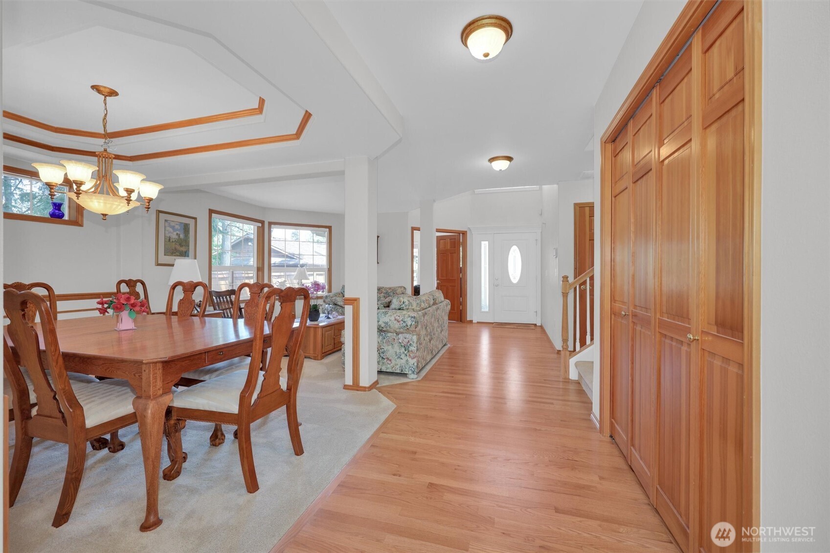 15403 Southeast 254th Street Covington, WA 98042 - Photo 7 of 22 a view of a dining room with furniture and wooden floor
