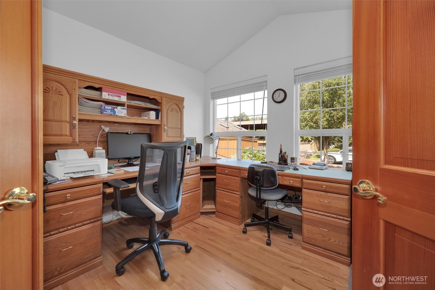 15403 Southeast 254th Street Covington, WA 98042 - Photo 10 of 22 a view of a workspace with furniture and a window