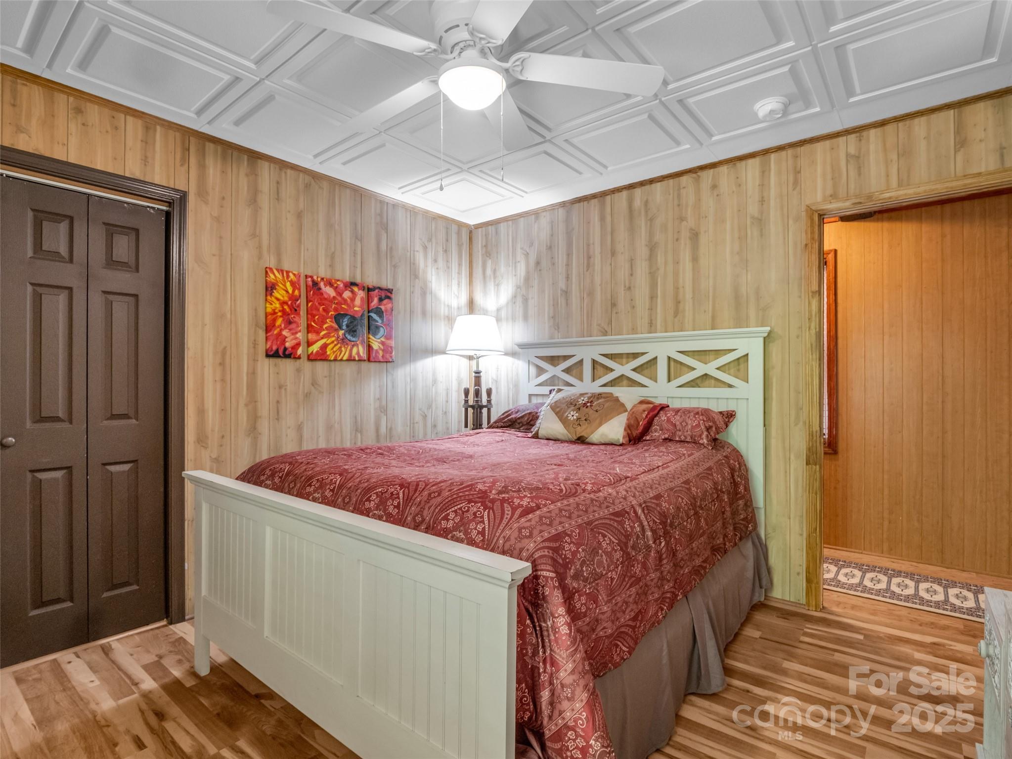 479 Camp Hill Road Mill Spring, NC 28756 - Photo 24 of 48 a bed room with a bed and a window
