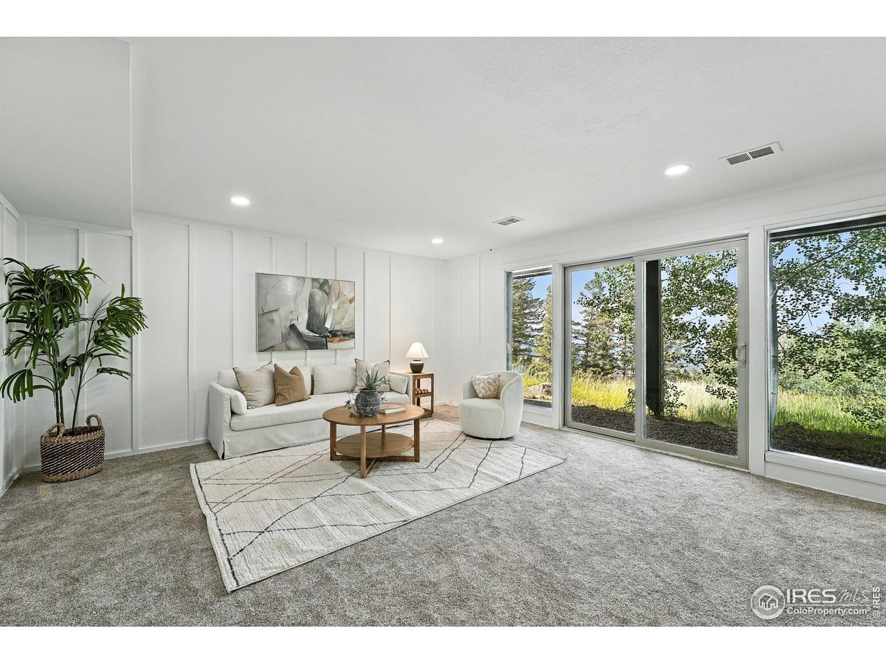 1575 Deer Trail Road Boulder, CO 80302 - Photo 23 of 39 a living room with furniture and a large window