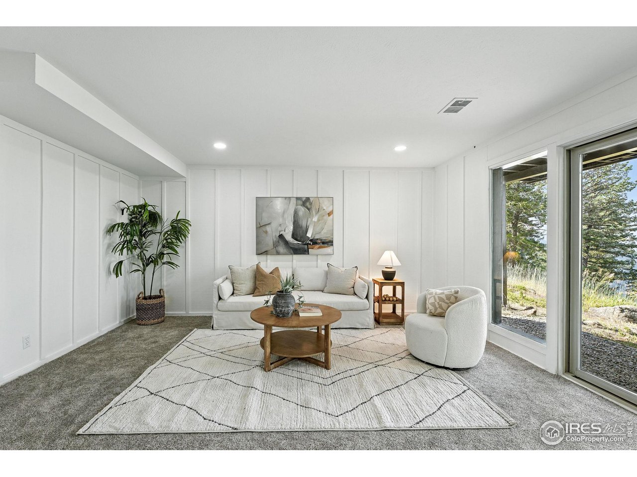1575 Deer Trail Road Boulder, CO 80302 - Photo 24 of 39 a living room with furniture and a potted plant