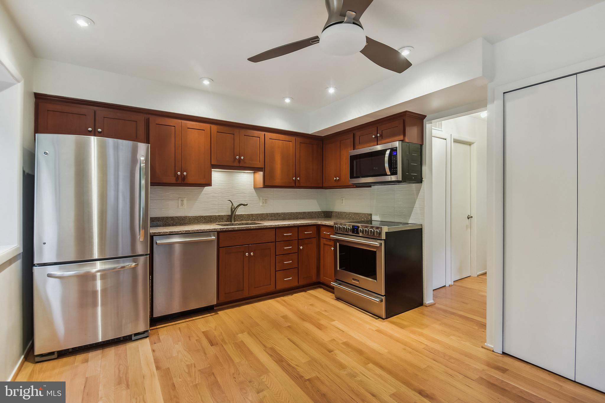 2000 Winged Foot Court Reston, VA 20191 - Photo 14 of 48 Granite counters and stainless appliances.