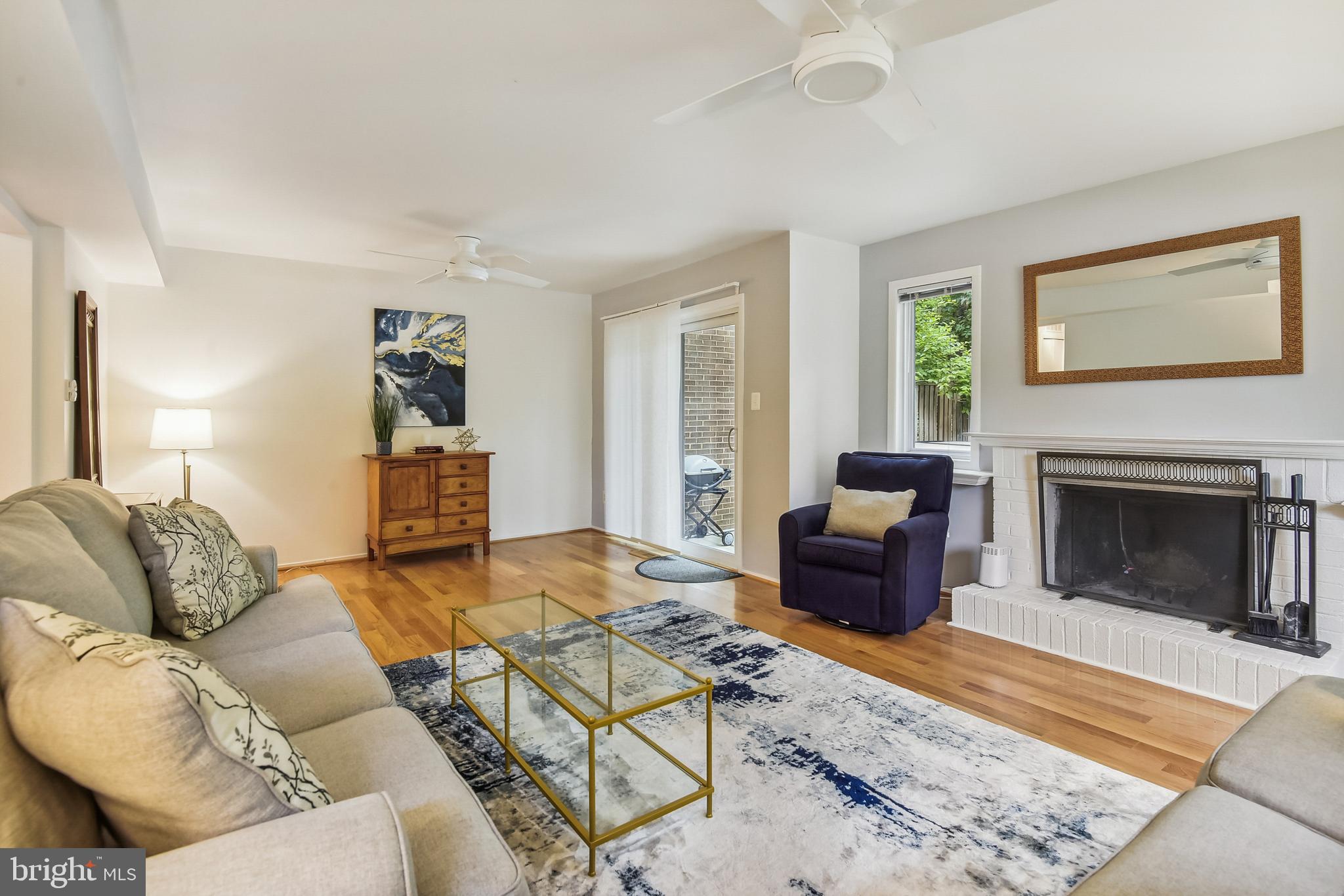 2000 Winged Foot Court Reston, VA 20191 - Photo 6 of 48 Wood burning fireplace in living room.