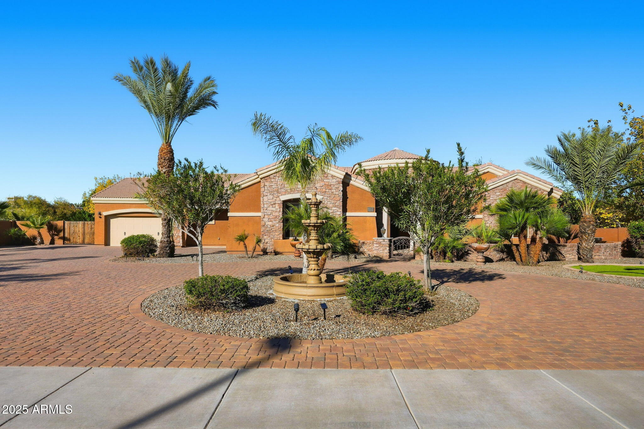 2218 East Brooks Farm Road Gilbert, AZ 85298 - Photo 9 of 55 a view of a house with a patio
