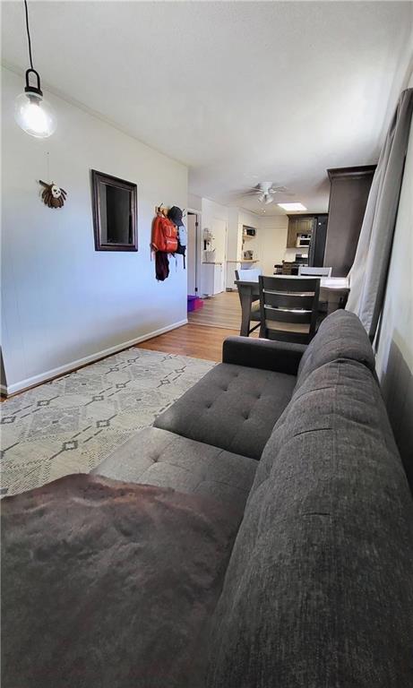 2070 Kingston Highway Rome, GA 30161 - Photo 13 of 48 a living room with furniture and a flat screen tv