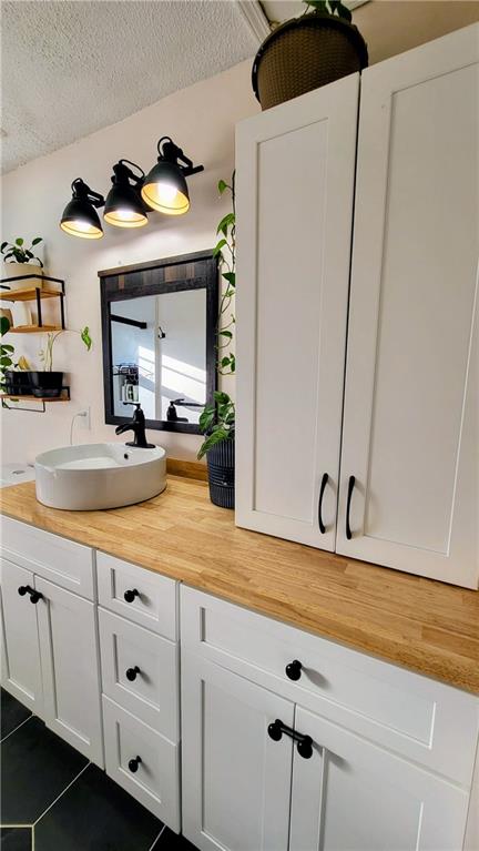 2070 Kingston Highway Rome, GA 30161 - Photo 19 of 48 a bathroom with a sink and two mirror