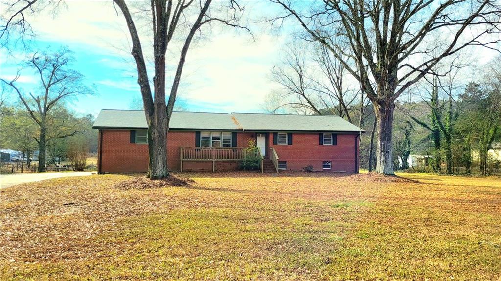 2070 Kingston Highway Rome, GA 30161 - Photo 38 of 48 a house that has a tree in front of it