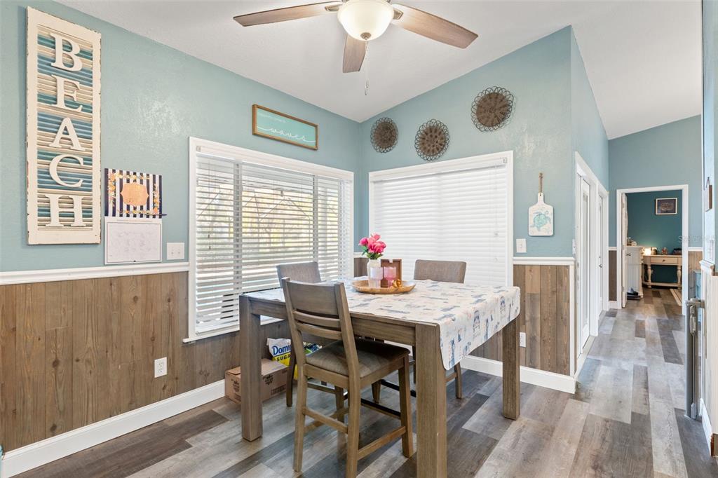 7180 Royal Oak Drive Spring Hill, FL 34607 - Photo 16 of 42 a view of a dining room with furniture and window