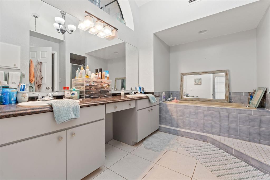 7180 Royal Oak Drive Spring Hill, FL 34607 - Photo 21 of 42 a kitchen with stainless steel appliances granite countertop a sink and cabinets