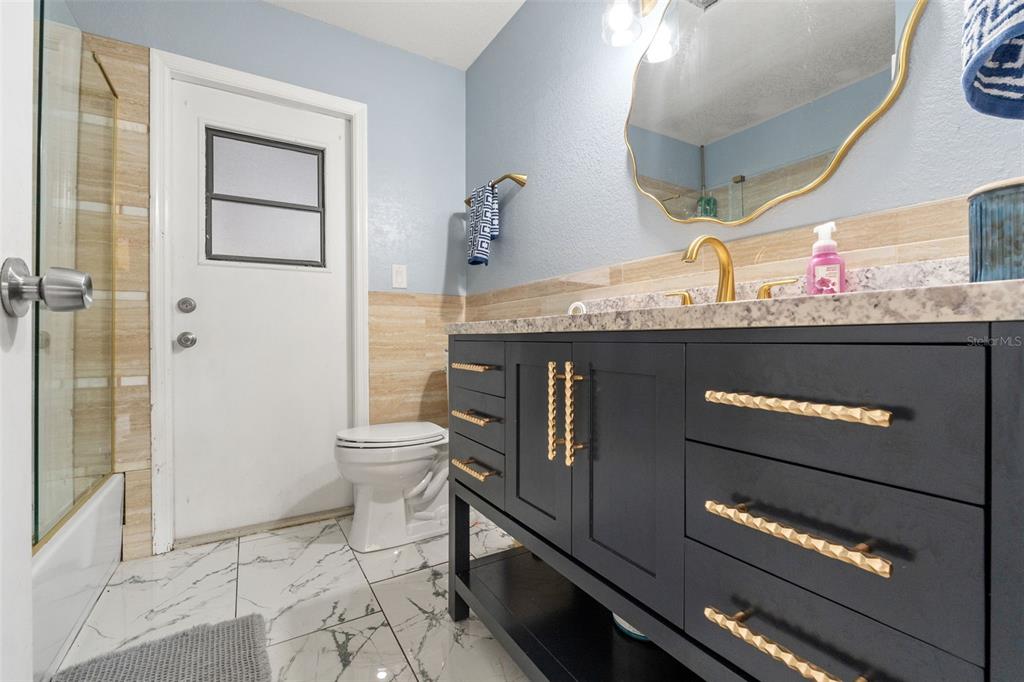 7180 Royal Oak Drive Spring Hill, FL 34607 - Photo 28 of 42 a view of bathroom with dual sinks