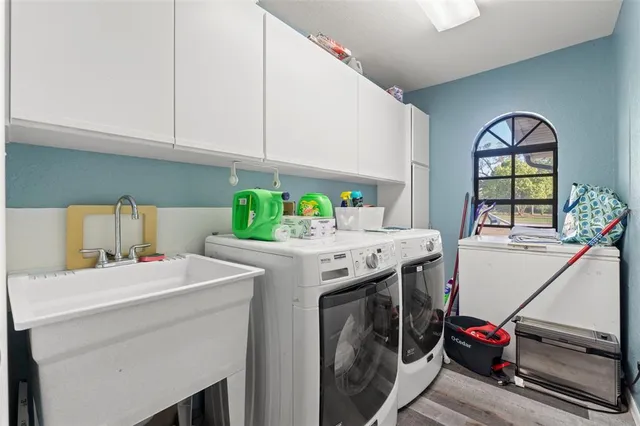 a utility room with dryer and washer