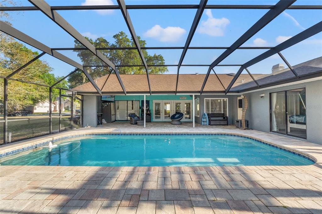 7180 Royal Oak Drive Spring Hill, FL 34607 - Photo 35 of 42 a view of a swimming pool with a patio