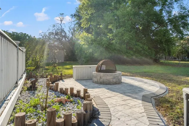 a view of a chairs and table in the patio