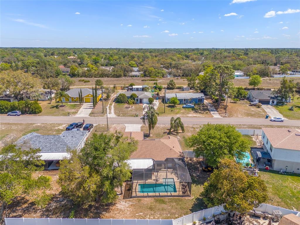 7180 Royal Oak Drive Spring Hill, FL 34607 - Photo 40 of 42 a view of a city with mountains in the background
