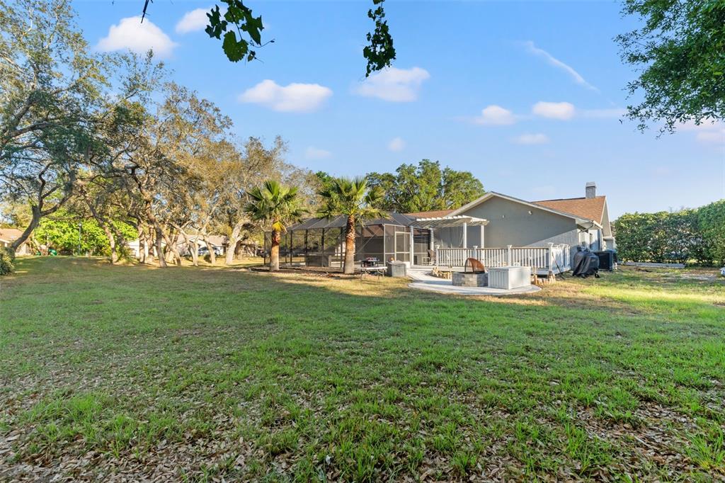 7180 Royal Oak Drive Spring Hill, FL 34607 - Photo 4 of 42 a front view of house with yard