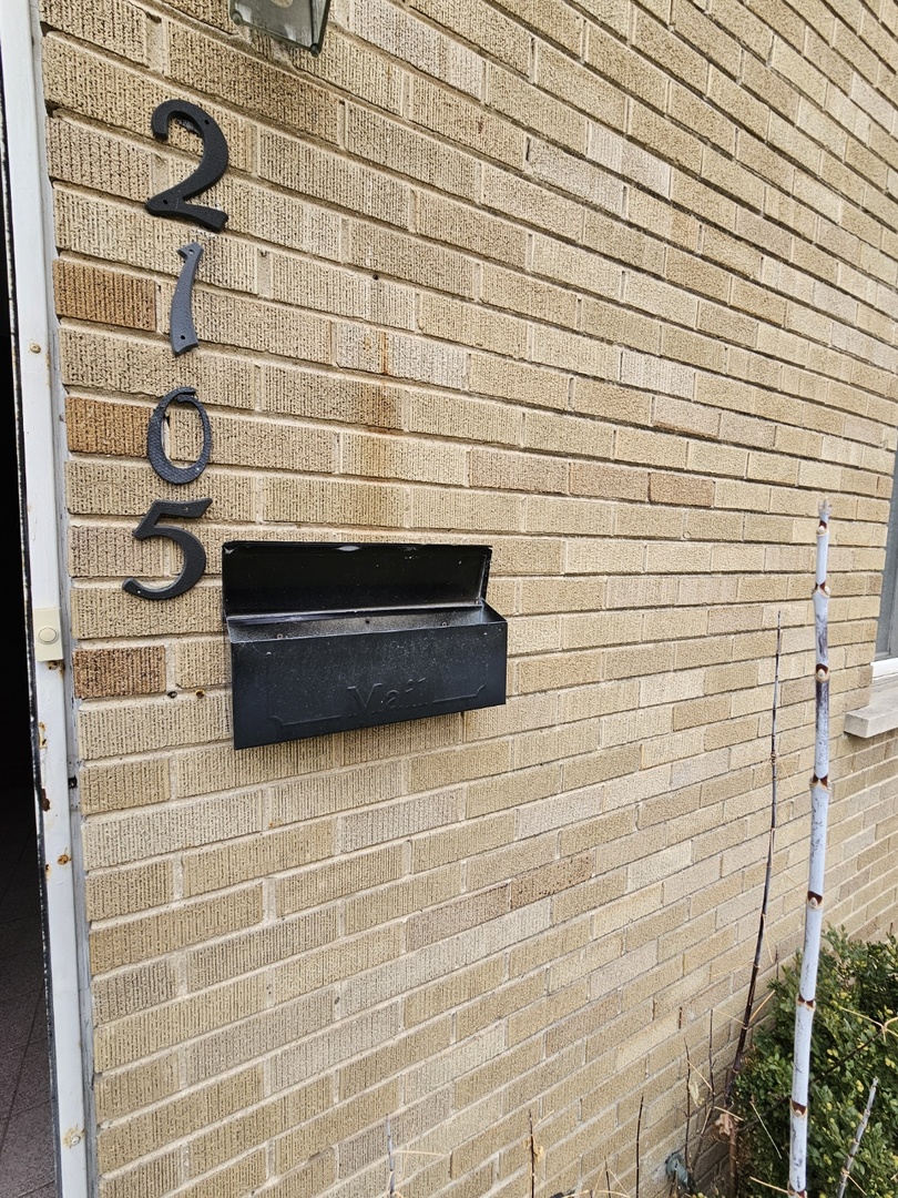 2105 171st Street Hazel Crest, IL 60429 - Photo 1 of 11 a bathroom with a shower