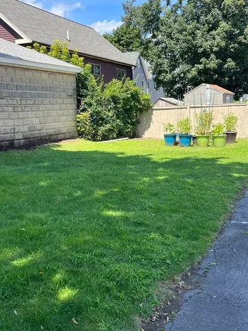 a view of car parked on the side of street
