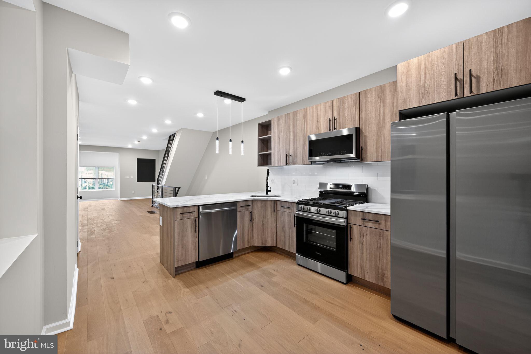 6019 Wharton Street Philadelphia, PA 19143 - Photo 12 of 30 Modern kitchen with sleek finishes.