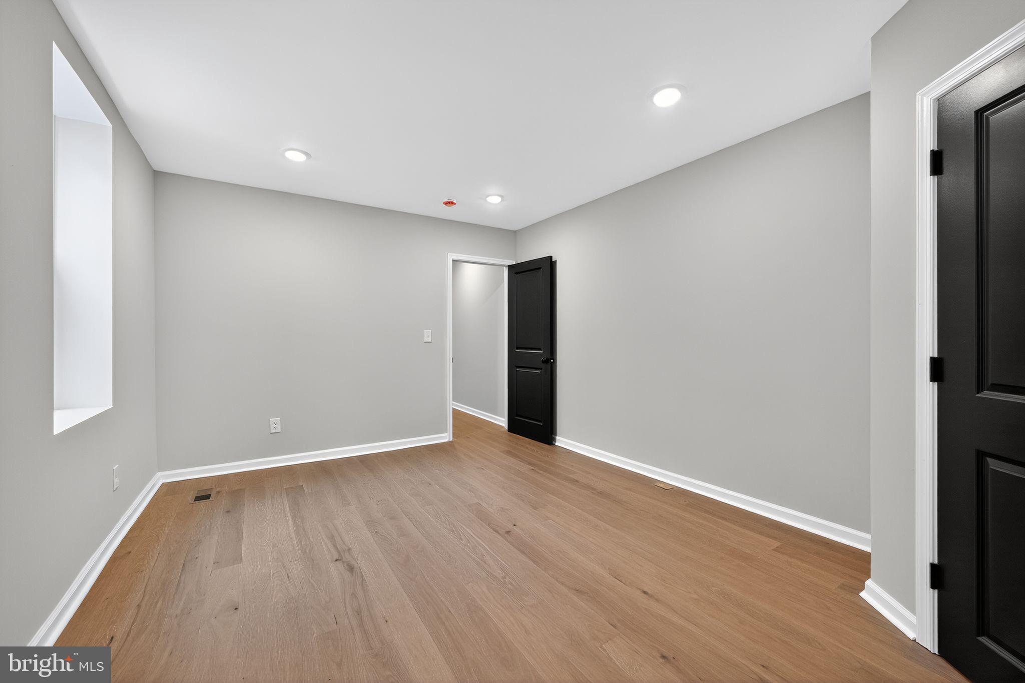 6019 Wharton Street Philadelphia, PA 19143 - Photo 16 of 30 Spacious, modern room with sleek design.