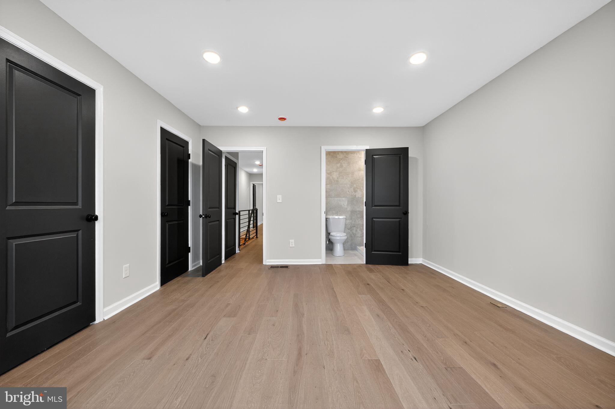 6019 Wharton Street Philadelphia, PA 19143 - Photo 18 of 30 Spacious room with modern black accents.