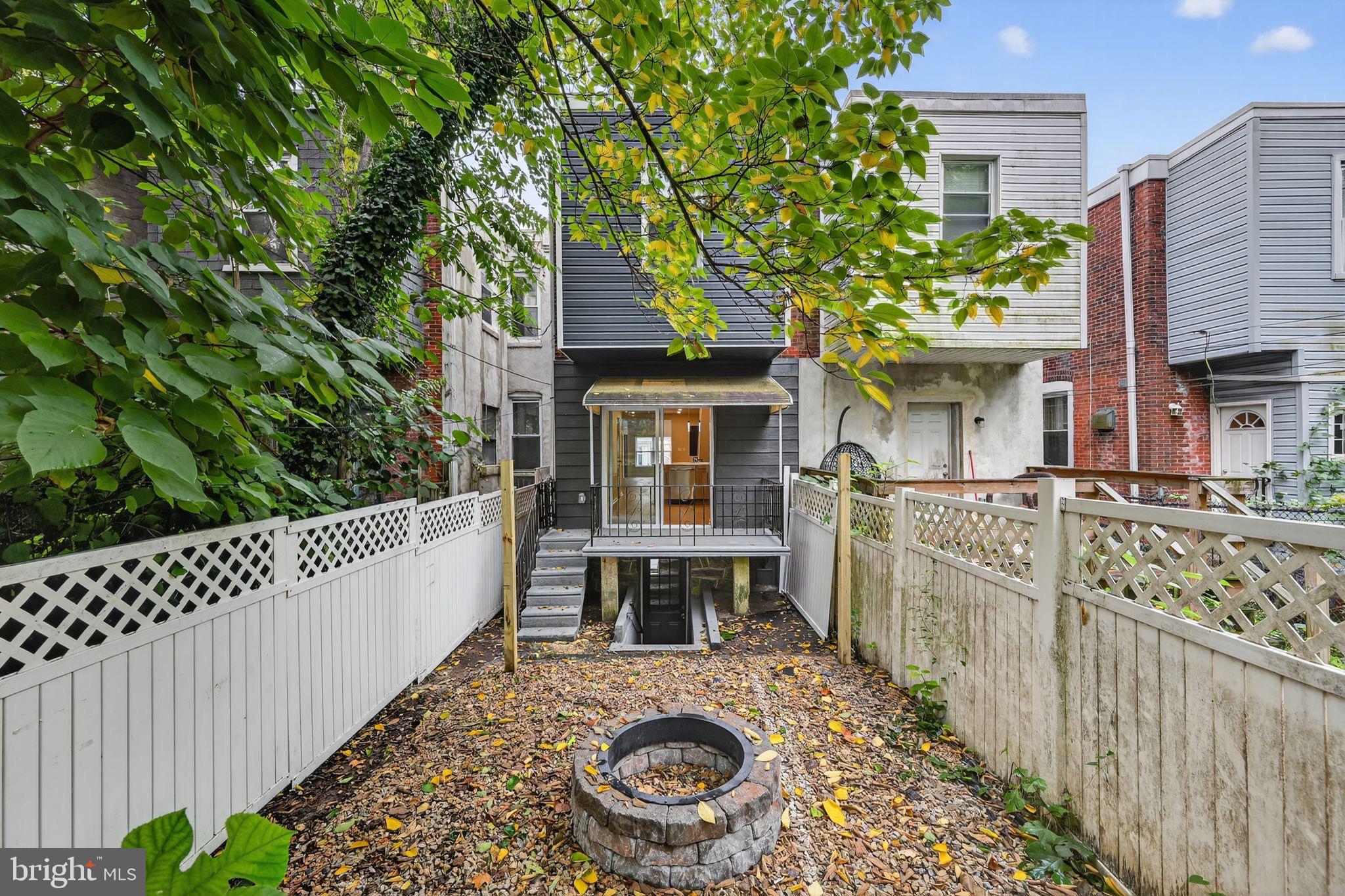 6019 Wharton Street Philadelphia, PA 19143 - Photo 24 of 30 Charming backyard retreat with fire pit.