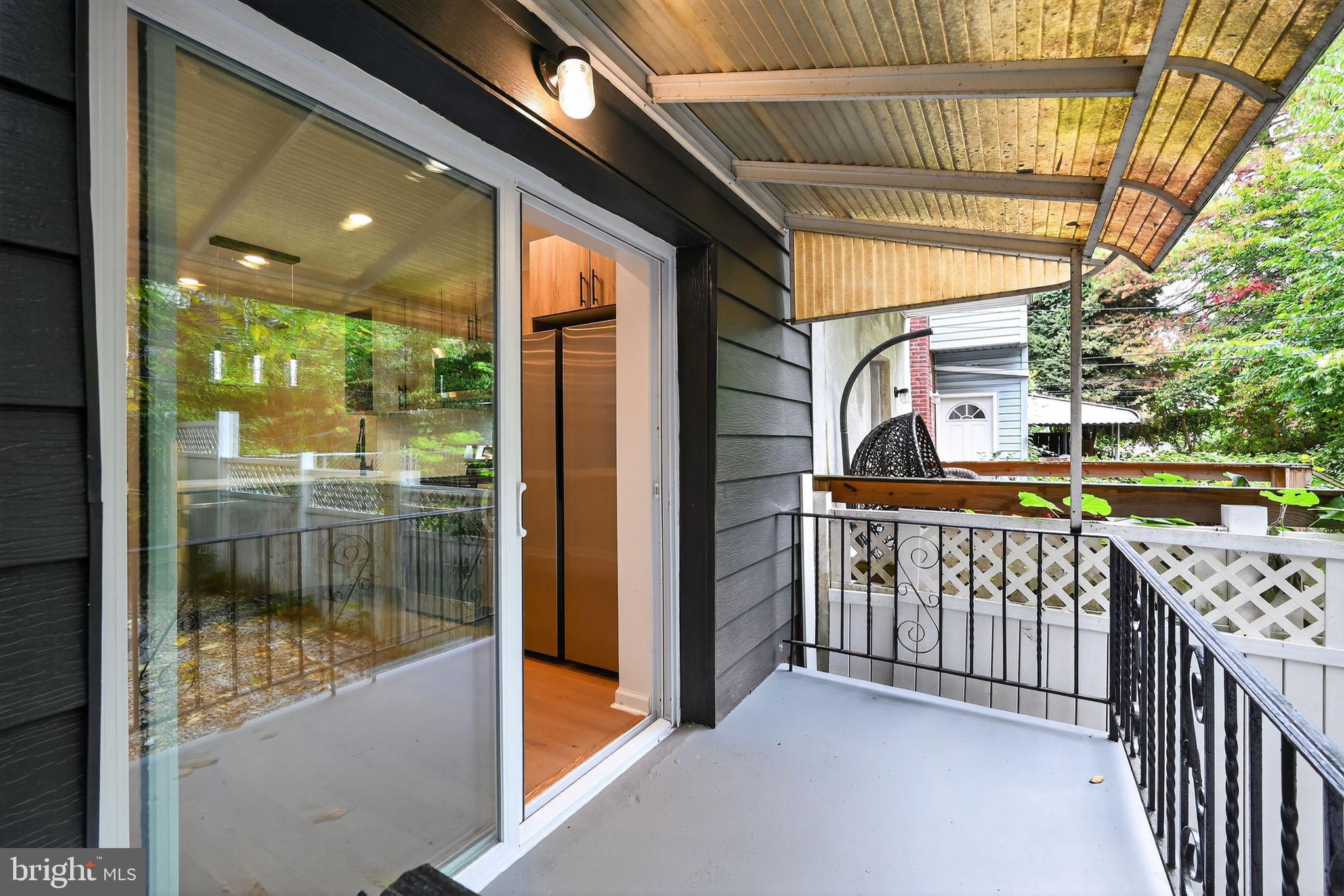 6019 Wharton Street Philadelphia, PA 19143 - Photo 28 of 30 Charming balcony with serene outdoor views.