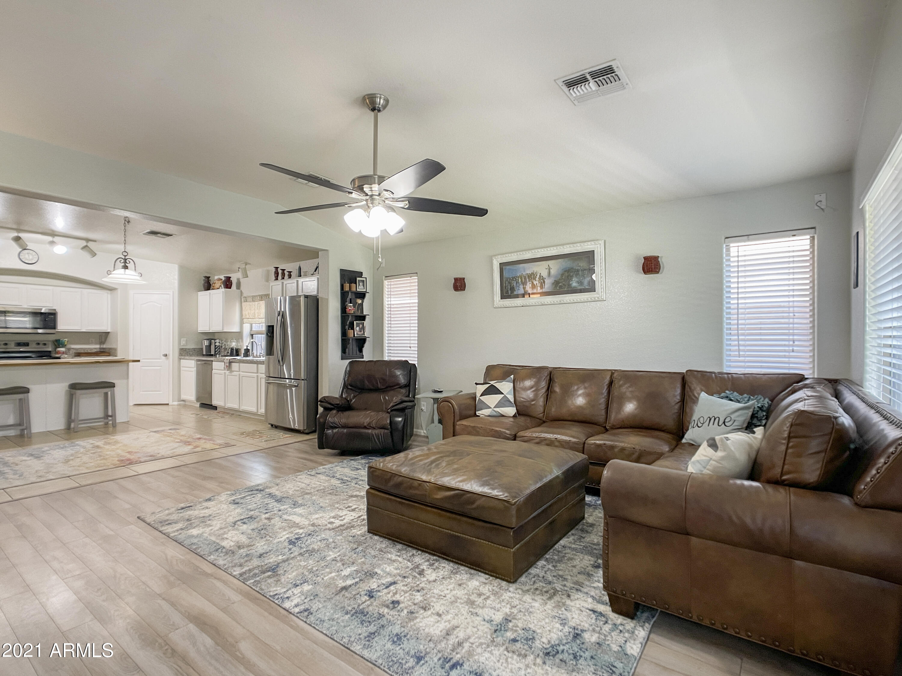 42558 Venture Road Maricopa, AZ 85138 - Photo 13 of 24 Family Room with view to kitchen