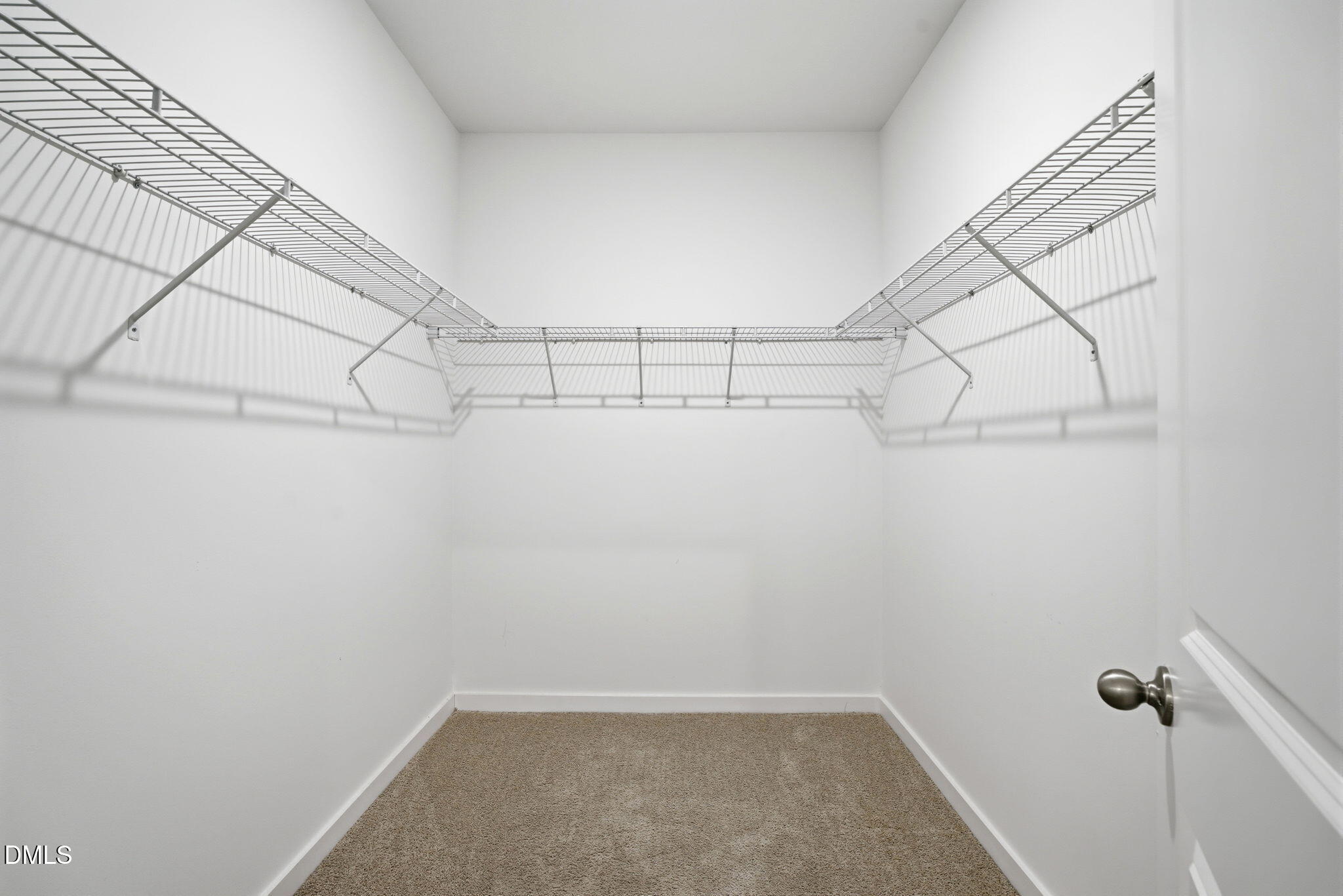 161 Tupelo Dr Spring Spring Hope, NC 27882 - Photo 19 of 28 a view of a room with racks on the wall
