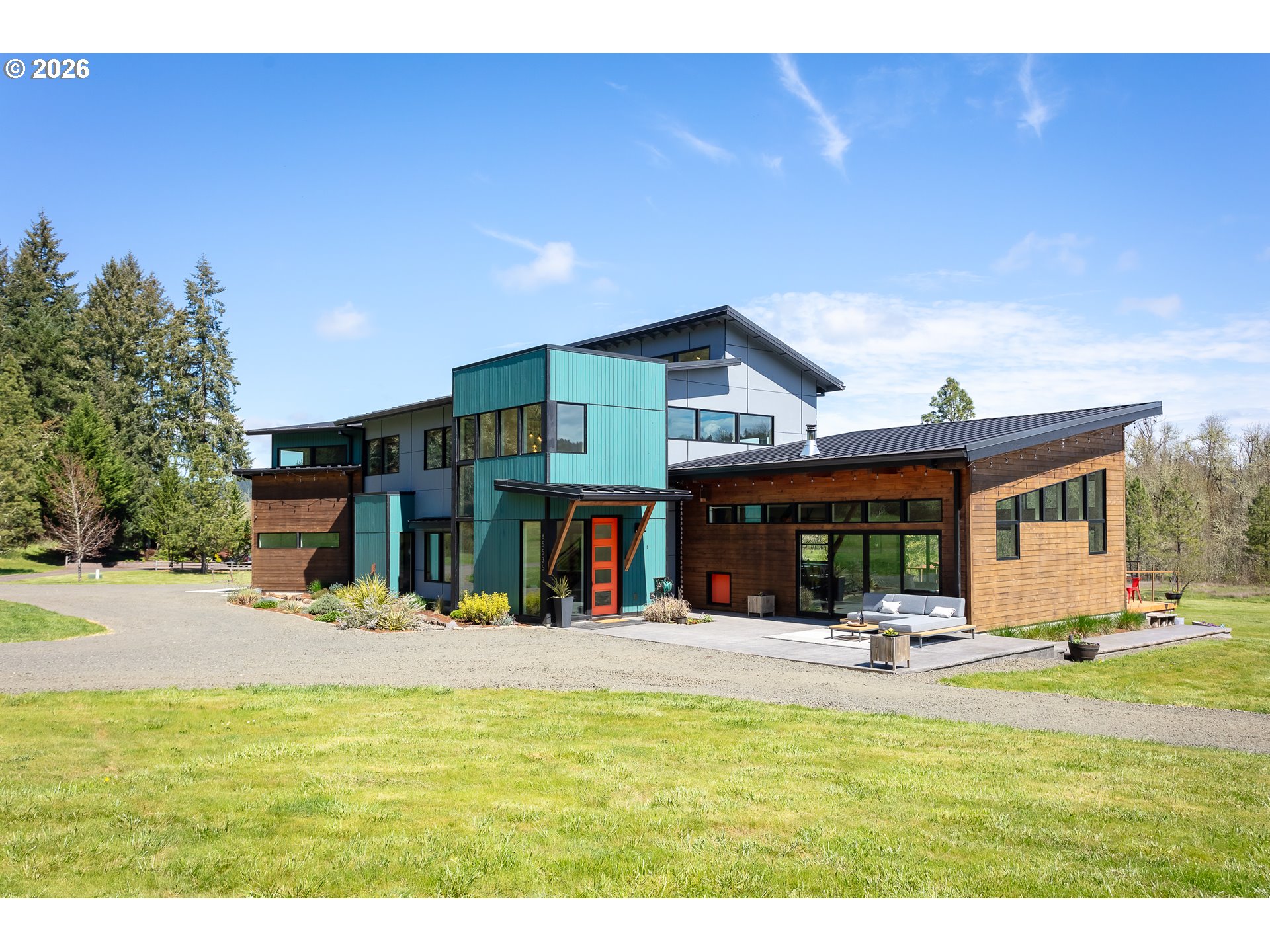 a view of a swimming pool with a house