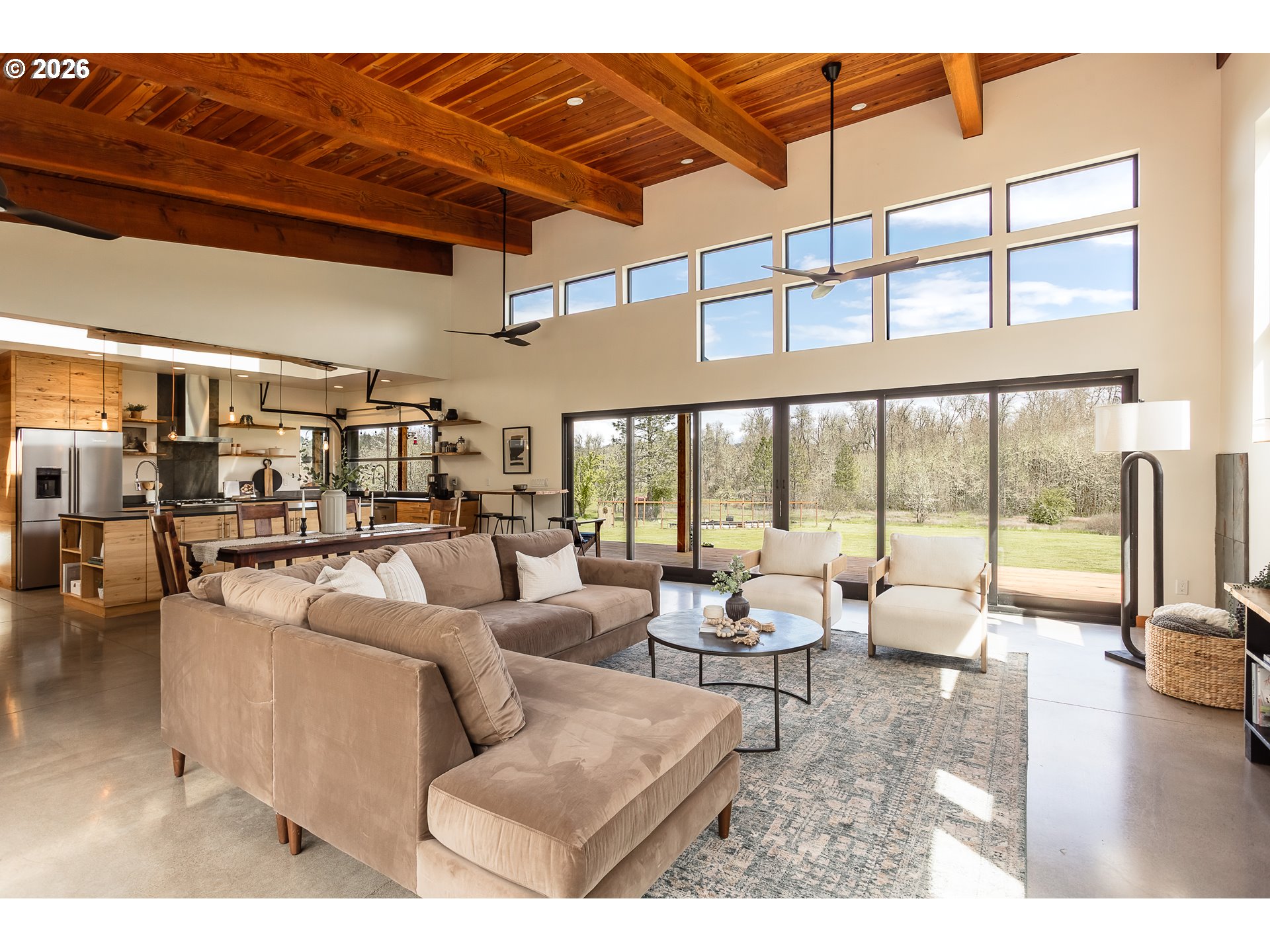 85535 Lancer Lane Eugene, OR 97405 - Photo 14 of 45 a living room with furniture and a floor to ceiling window