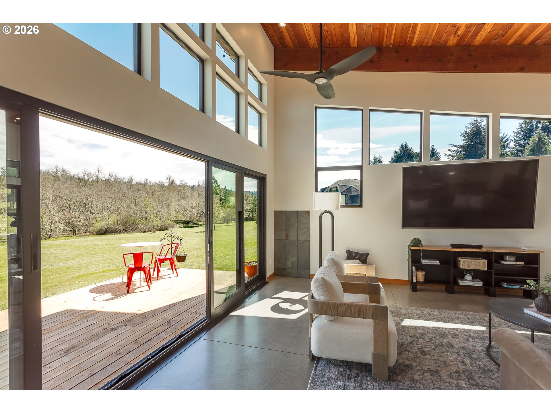 85535 Lancer Lane Eugene, OR 97405 - Photo 16 of 45 a living room with furniture and a flat screen tv