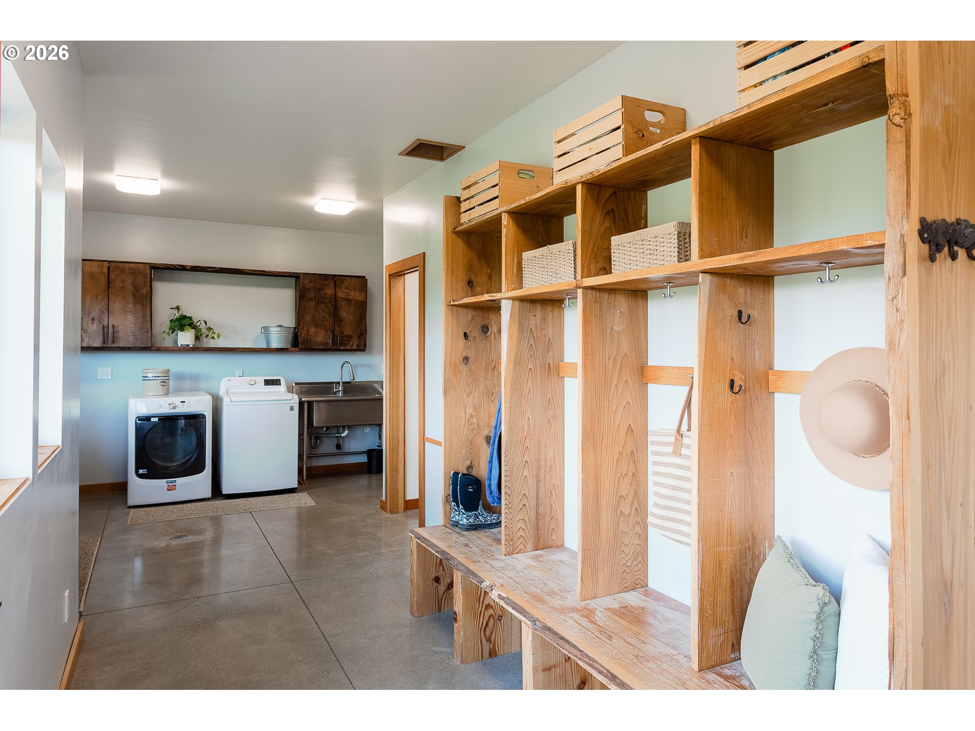 85535 Lancer Lane Eugene, OR 97405 - Photo 20 of 45 a living room with stainless steel appliances kitchen island a rug and a view of kitchen