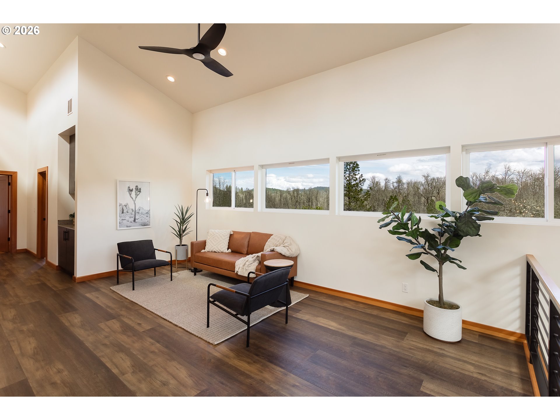 85535 Lancer Lane Eugene, OR 97405 - Photo 27 of 45 a living room with furniture and a potted plant