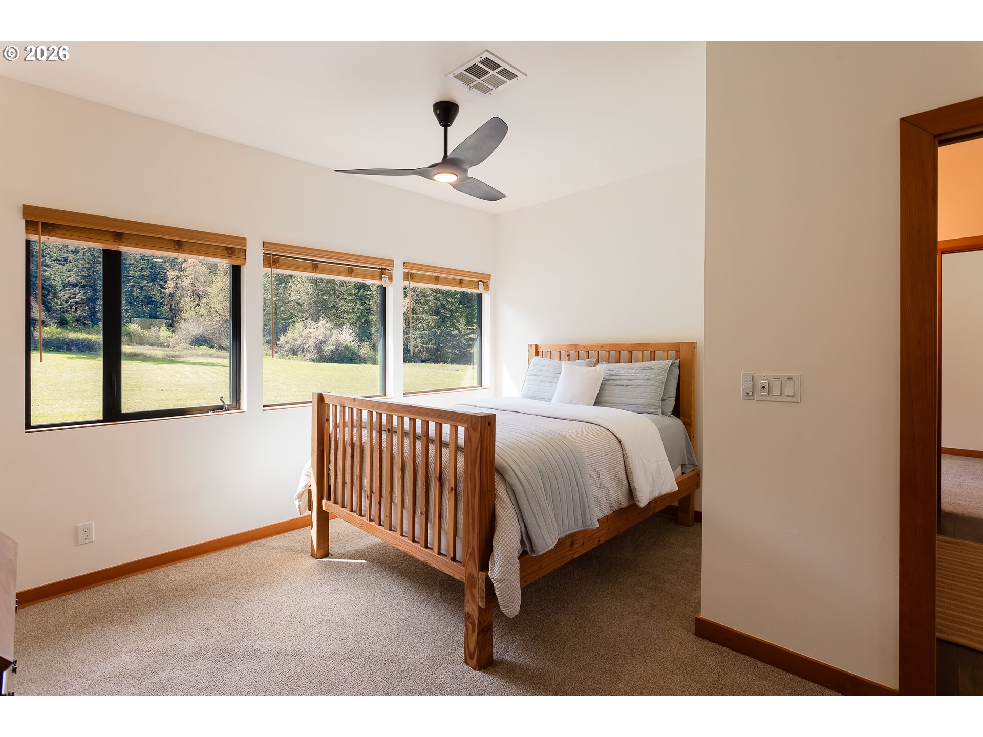 85535 Lancer Lane Eugene, OR 97405 - Photo 28 of 45 a bed room with a bed and a large window