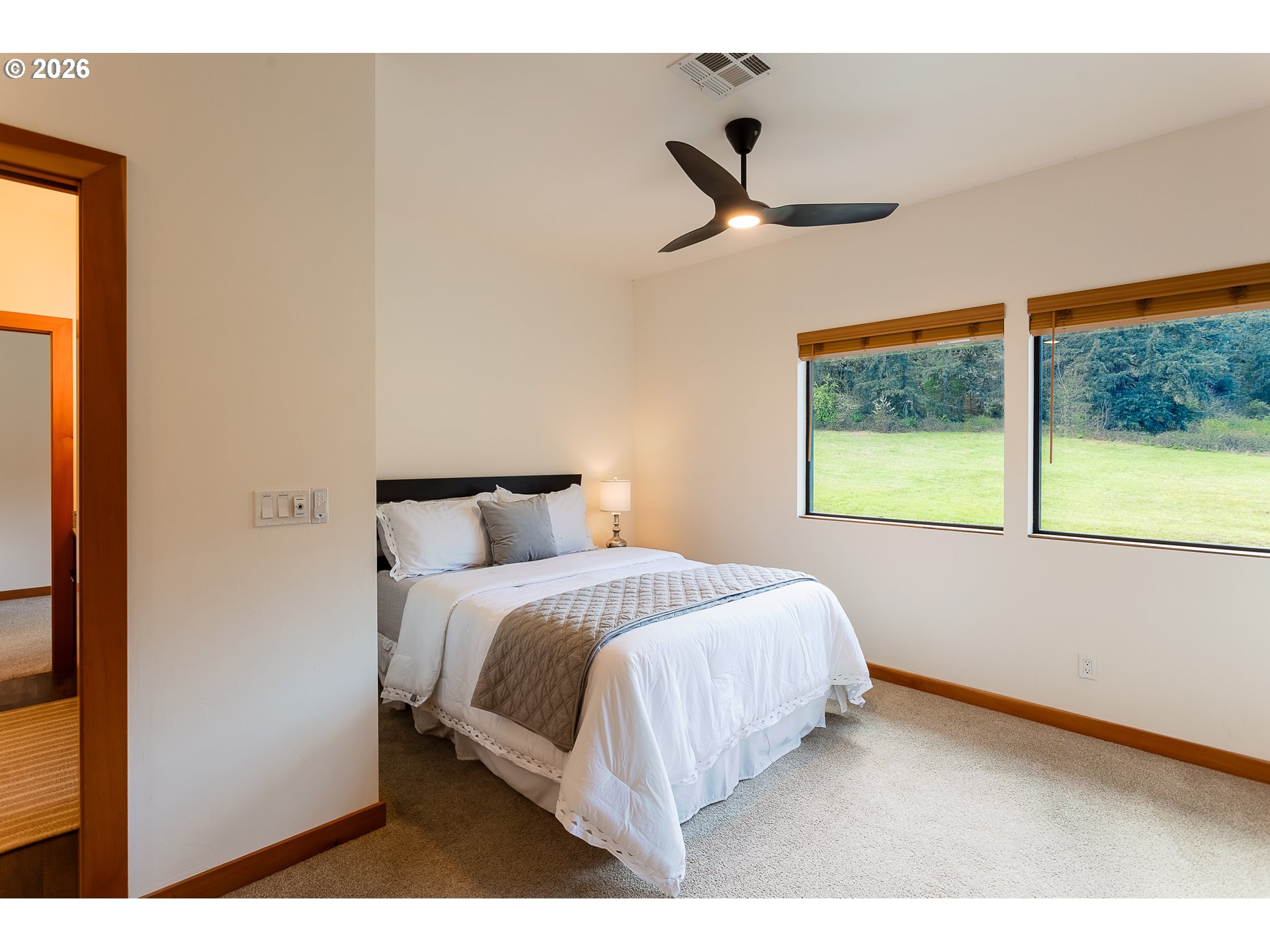 85535 Lancer Lane Eugene, OR 97405 - Photo 31 of 45 a bedroom with a bed and a large window