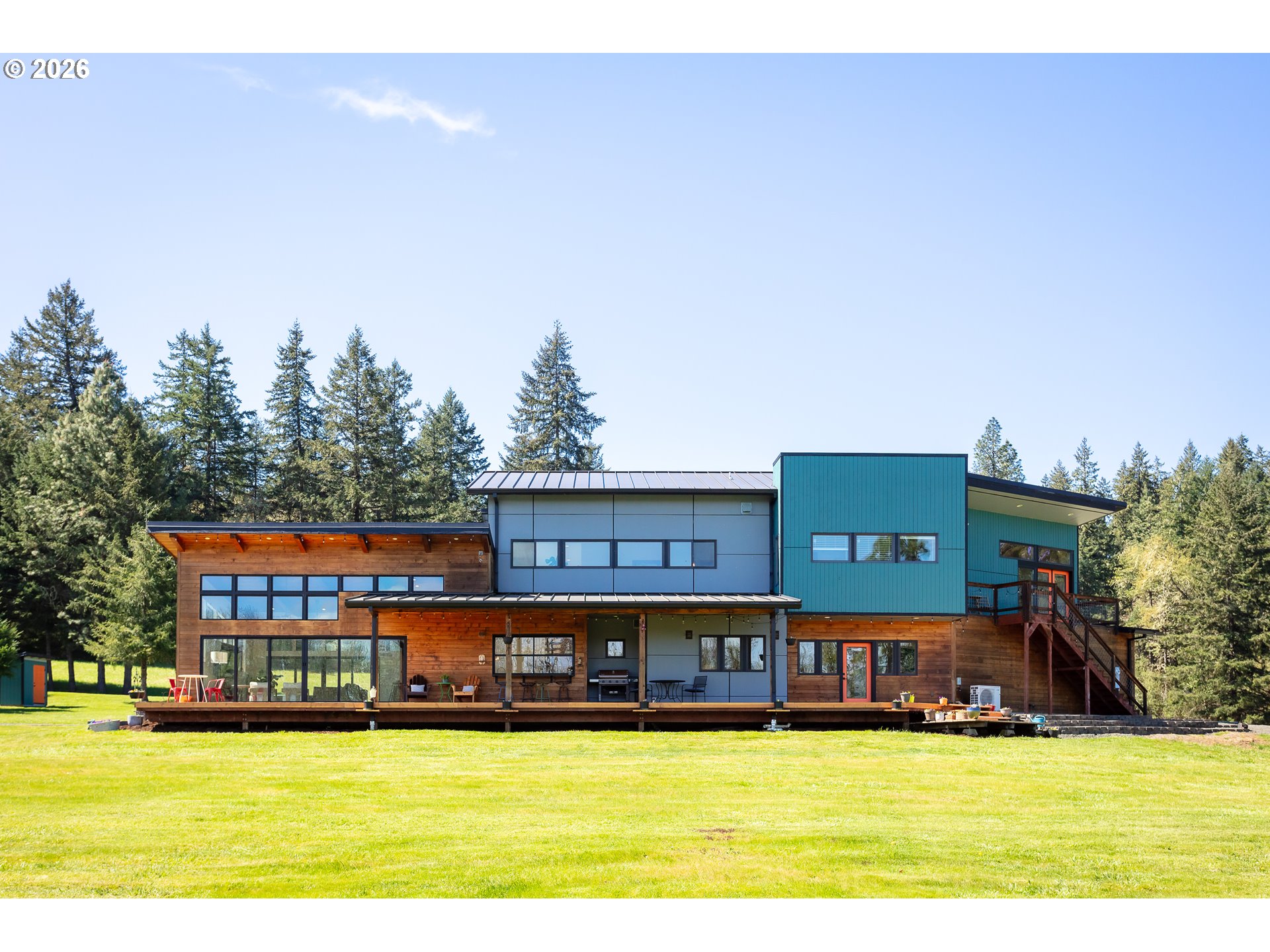 85535 Lancer Lane Eugene, OR 97405 - Photo 40 of 45 a view of a swimming pool with lawn chairs and plants