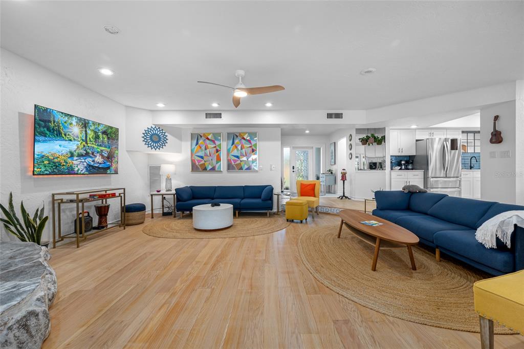 2153 Karan Way Clearwater, FL 33763 - Photo 12 of 65 a living room with furniture and wooden floor