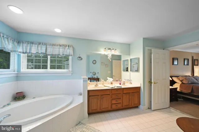 a bedroom with a bed and a desk