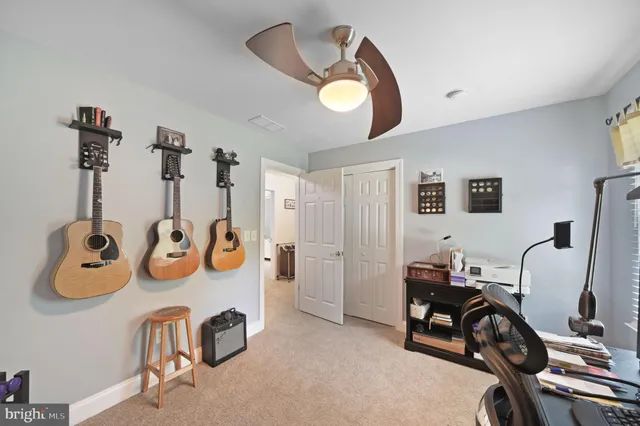 a view of a chairs and table in the patio