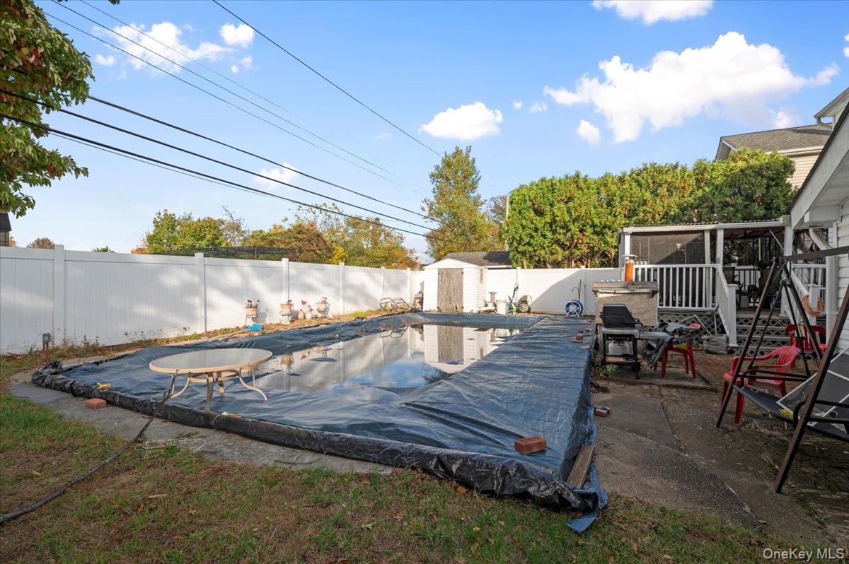 26 Bradford Lane Bethpage, NY 11714 - Photo 16 of 24 a view of a deck with chairs next to yard