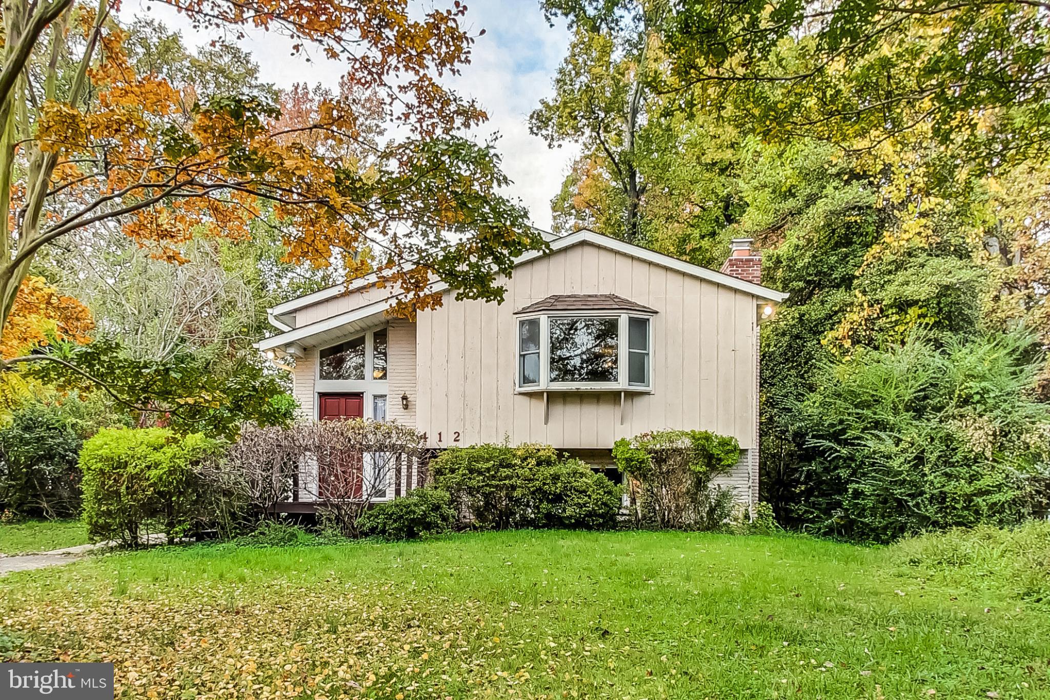 412 Walnut Drive Annapolis, MD 21403 - Photo 1 of 42 a view of a house with backyard and garden