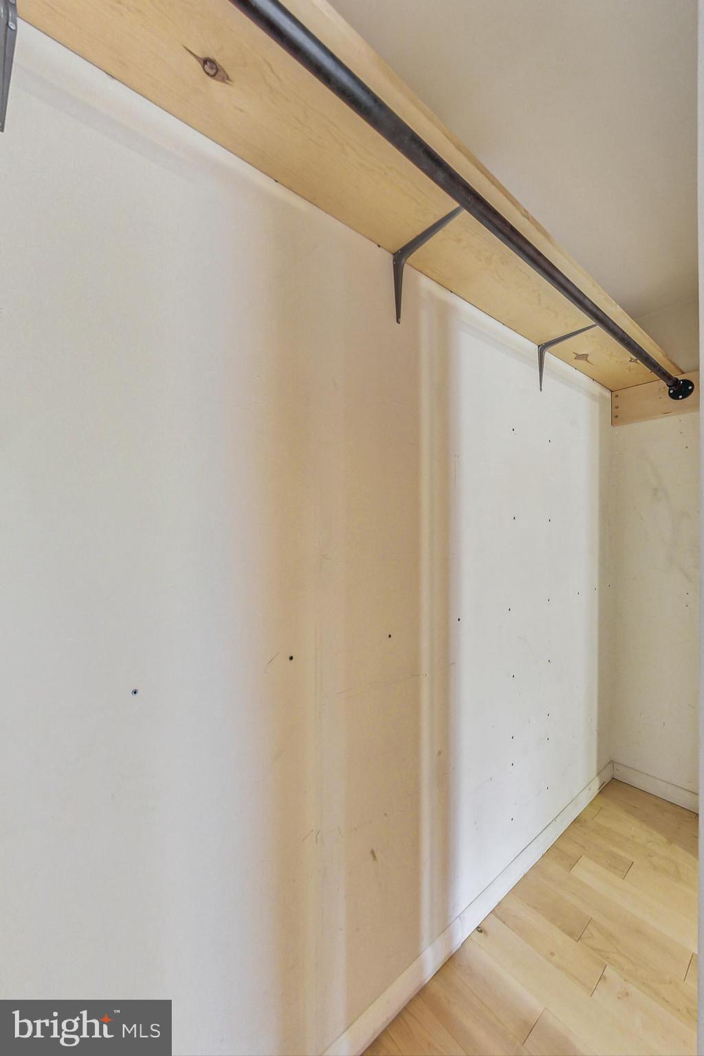 412 Walnut Drive Annapolis, MD 21403 - Photo 16 of 42 a view of walk in closet with empty racks