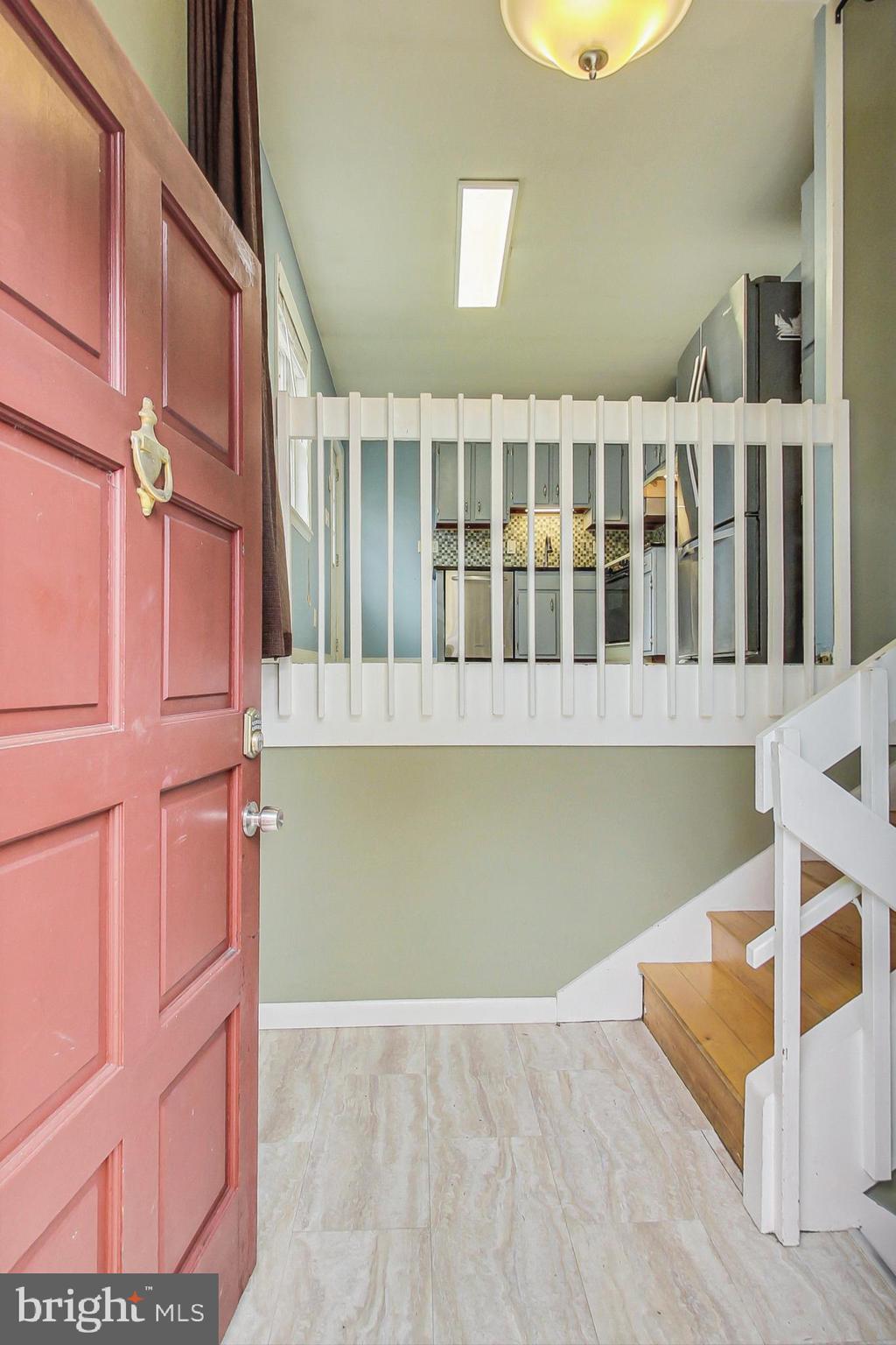 412 Walnut Drive Annapolis, MD 21403 - Photo 4 of 42 a view of an empty room with wooden floor